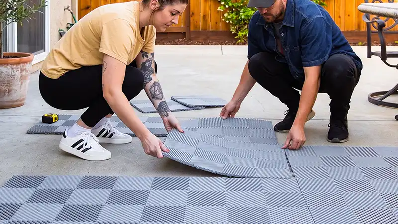 Two friends install Duragrid on their backyard patio.